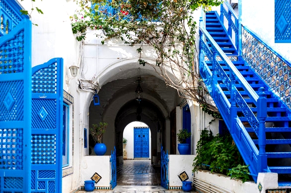 House with blue doors and windows