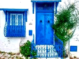 House with blue doors and windows